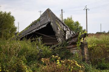 Fototapeta na wymiar The ruins of an old village house