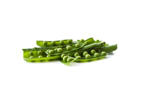 Green peas isolated on a white background. Fresh green peas on a white background. Studio photo. Isolated macro food photo close up from above on white background.