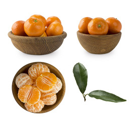 Set of frwsh tangerines isolated on white. Mandarins in a wooden bowl with copy space for text. Ripe and tasty tangerines isolated on white background. Clementines on a white background. 