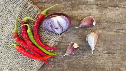 Spicy and healthy vegetables on wooden background.The harvest from the garden.