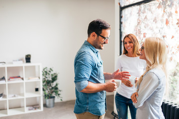 Happy casual business people on a break.