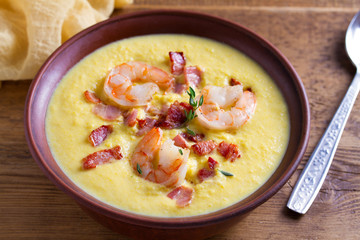 Creamy corn vegetable soup with shrimps and bacon