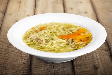 Vegetable soup isolated on a white background