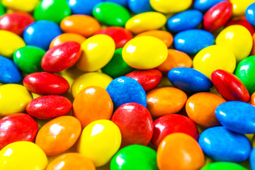 Fototapeta na wymiar Colorful button candies closeup