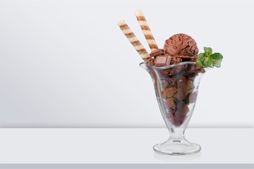 Scoops of ice cream with syrup