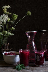 Fresh homemade raspberry juice made of 100%  organic fruit. Summer season. Healthy lifestyle