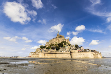 Le Mont-Saint-Michel, France, an island and monastery in Normandy, World Heritage Site since 1979. Views from the sand at low tide