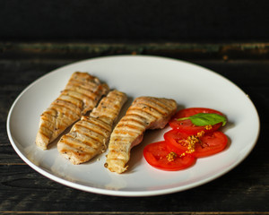 meat chicken grill - serving in a white plate - fry meat. food background. top view and copy space