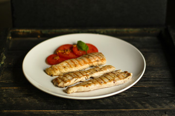 meat chicken grill - serving in a white plate - fry meat. food background. top view and copy space