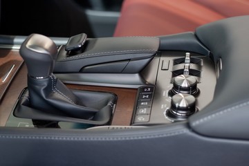 Interior of new modern car. Passenger compartment finish with genuine leather.