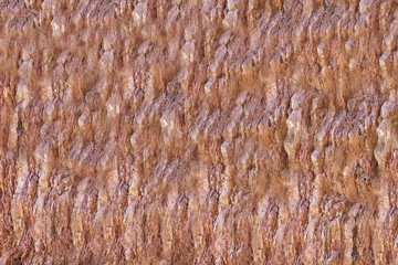 The texture of the rock surface. Stone background