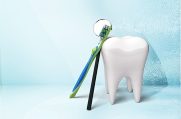 Big tooth model and toothbrush on light