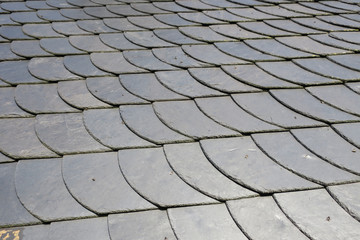 roofing: pattern of gray slate on an antique roof