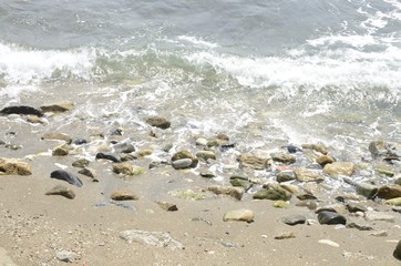 Fototapeta na wymiar Beach stones at the shore