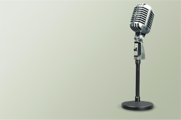 Retro style microphone on  background
