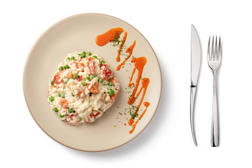 Risotto served on white table