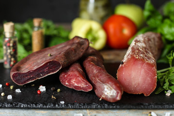 meat smoked jerky - raw meat sausage meat. food background. top view and copy space