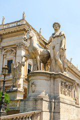 View on a historic statue in Rome, Italy on a sunny day.