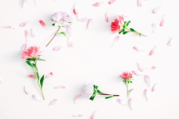 Fototapeta na wymiar Floral composition. Frame made of fresh flowers on white background. Flat lay, top view, copy space 
