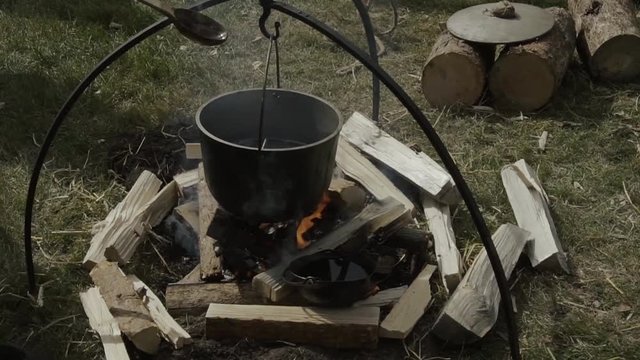 Cooking soup on a bonfire