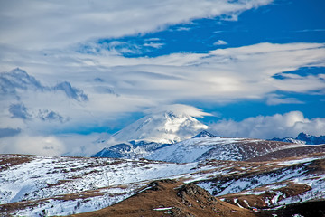 The top of Mount Elbrus appeared from behind the clouds. Arkhyz, Playground BTA