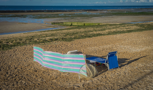 Langrune-Sur-Mer, France - 08 13 2018:  N&eacute;cessaires de plage &agrave; Langrune
