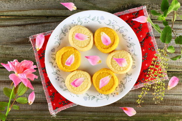 Popular traditional Indian gujarati mithai or sweet  penda garnish with rose petal 