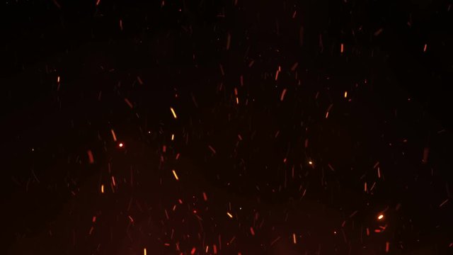 Beautiful Burning Hot Sparks Rising from Large Fire in Night Sky. Abstract Isolated Fire Glowing Particles on Black Background Flying Up. Looped 3d Animation. Moving Up. 4k Ultra HD 3840x2160