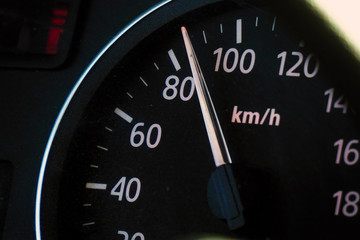 Photo speedometer in the car on the dashboard