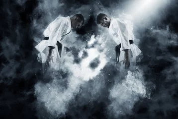 Fotobehang Vechtsport Twee mannelijke karategevechten