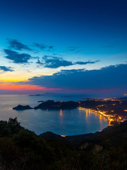 Fototapeta na wymiar View from the hill to Agios Georgios bay with the long beach at Corfu island Greece