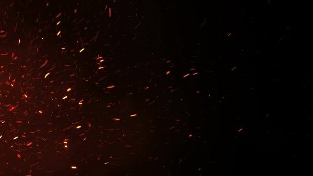 Beautiful Burning Hot Sparks Rising from Large Fire in Night Sky. Abstract Isolated Fire Glowing Particles on Black Background Slow Motion. Looped 3d Animation. Moving Side. 4k Ultra HD 3840x2160