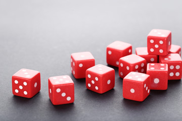 Red dice on grey background