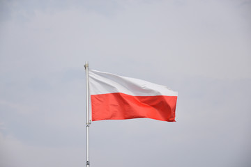 Naklejka na ściany i meble Waving Polish flag, closeup