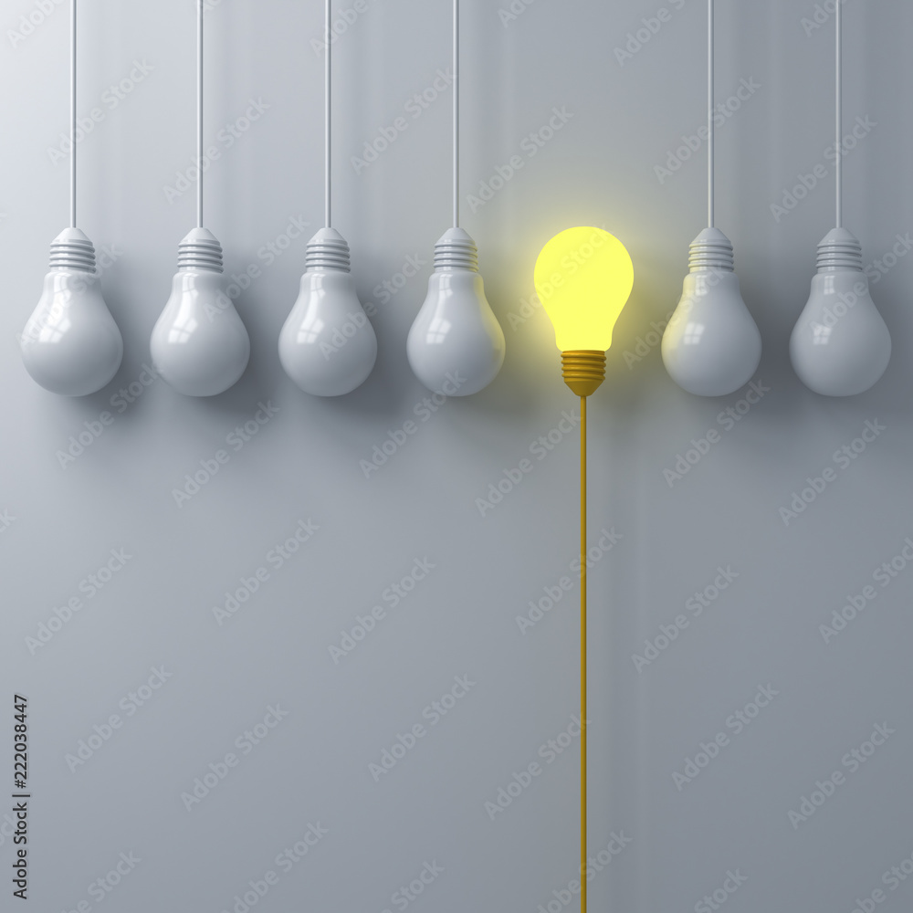 Poster Think different concept One glowing light bulb standing out from the dim or unlit white lightbulbs on white wall background with shadows leadership and individuality creative idea concept 3D rendering
