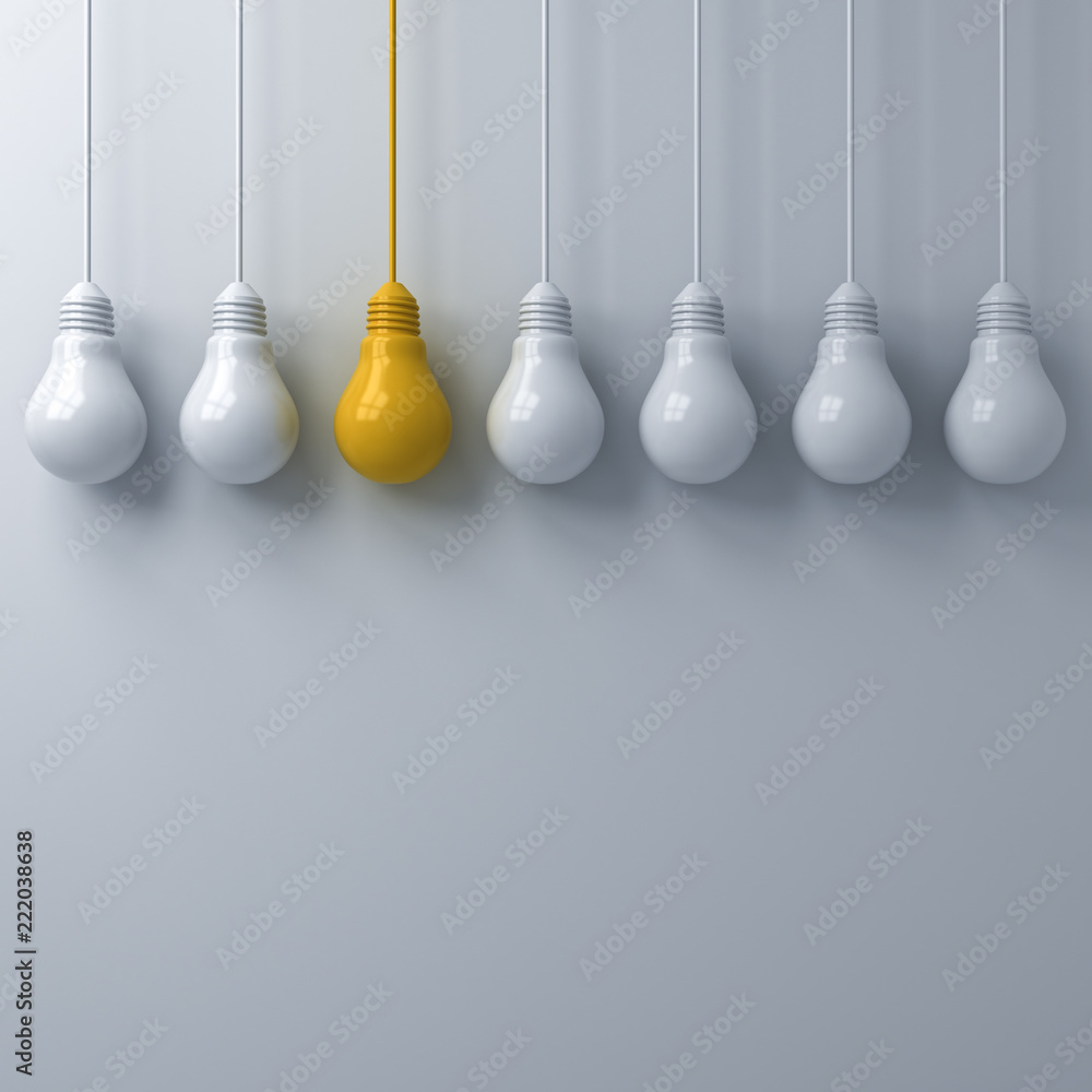 Aufkleber Think different concept One hanging yellow light bulb standing out from the white light bulbs on white wall background with shadows leadership and individuality creative idea concepts 3D rendering