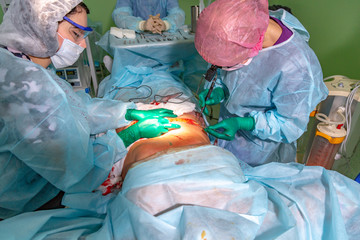 Surgical operation abdominoplasty. Surgical removal of fat tissue from the abdomen
