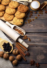 Home-made pastries, spices and cooking utensils on a wooden table. Traditions. Christmas aromas.