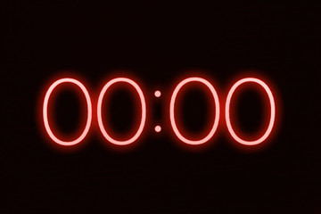 Digital clock timer stopwatch display showing 0 zero seconds remaining in glowing red numbers....