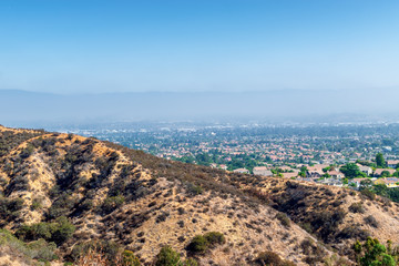 Inland empire morning haze covers cities below the mountains of Southern California