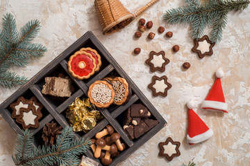 wooden box with Christmas symbols, top view, close-up