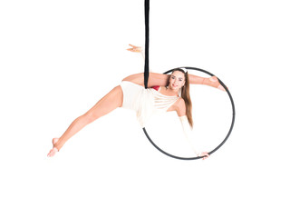 Young girl posing in an airy ring on a white background