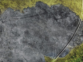 Burnt ground and grass - top view