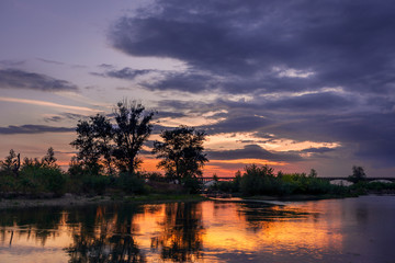 Fototapeta premium Beautiful sunset scene on the river