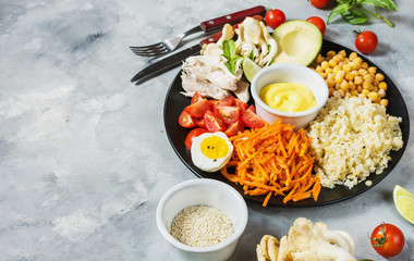 Healthy vegan lunch bowl on concrete background