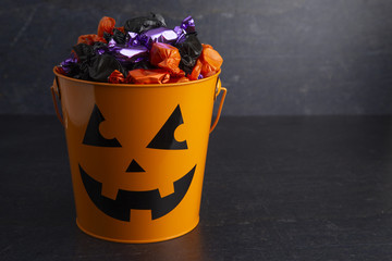Pumpkin Bucket Filled with Various Wrapped Candies