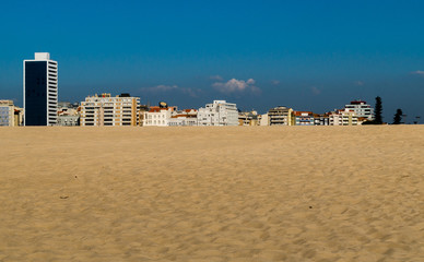 Figueira da Foz. Look from the beach to the coastal street and the city's hotels.