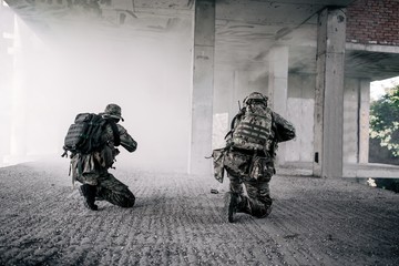 US soldiers stormed the building blowing up a smoke bomb