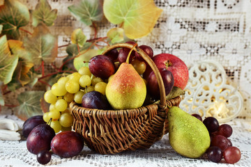 autumn fruits in vicker basket