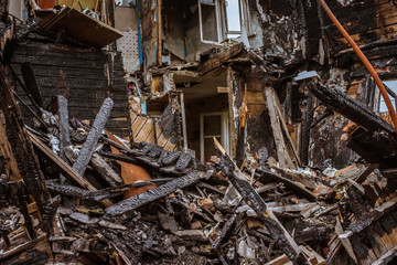 the old wooden burned-down house a view from inside